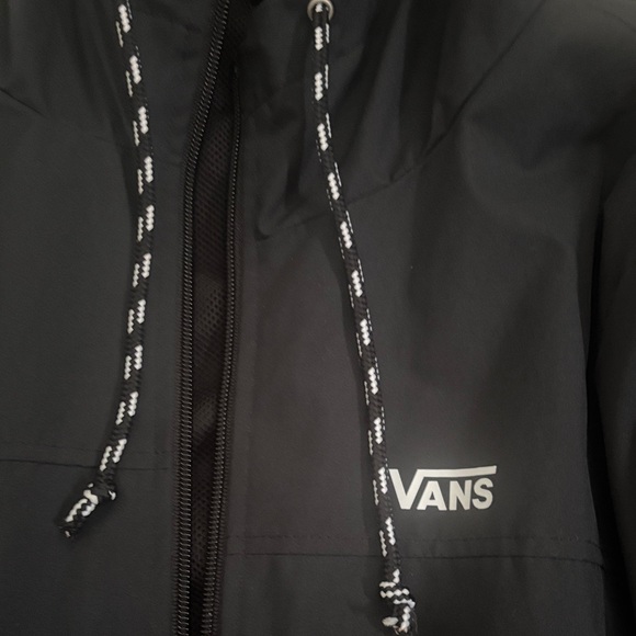 Men’s Vans Black Hooded Raincoat with Checkered Accents

Brand new!! - Picture 4 of 5